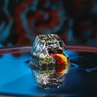 Dragon Fire artisan keycap with silver dragon and lava details – front view