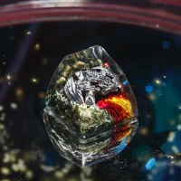 Side view of Dragon Fire keycap with lava eruption and dragon details
