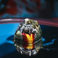 Artisan dragon keycap with mountain and fire effects – left side