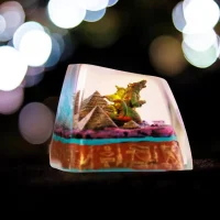 Side view of Godzilla resin keycap on keyboard