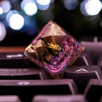 Golden pyramid with Godzilla on artisan keycap